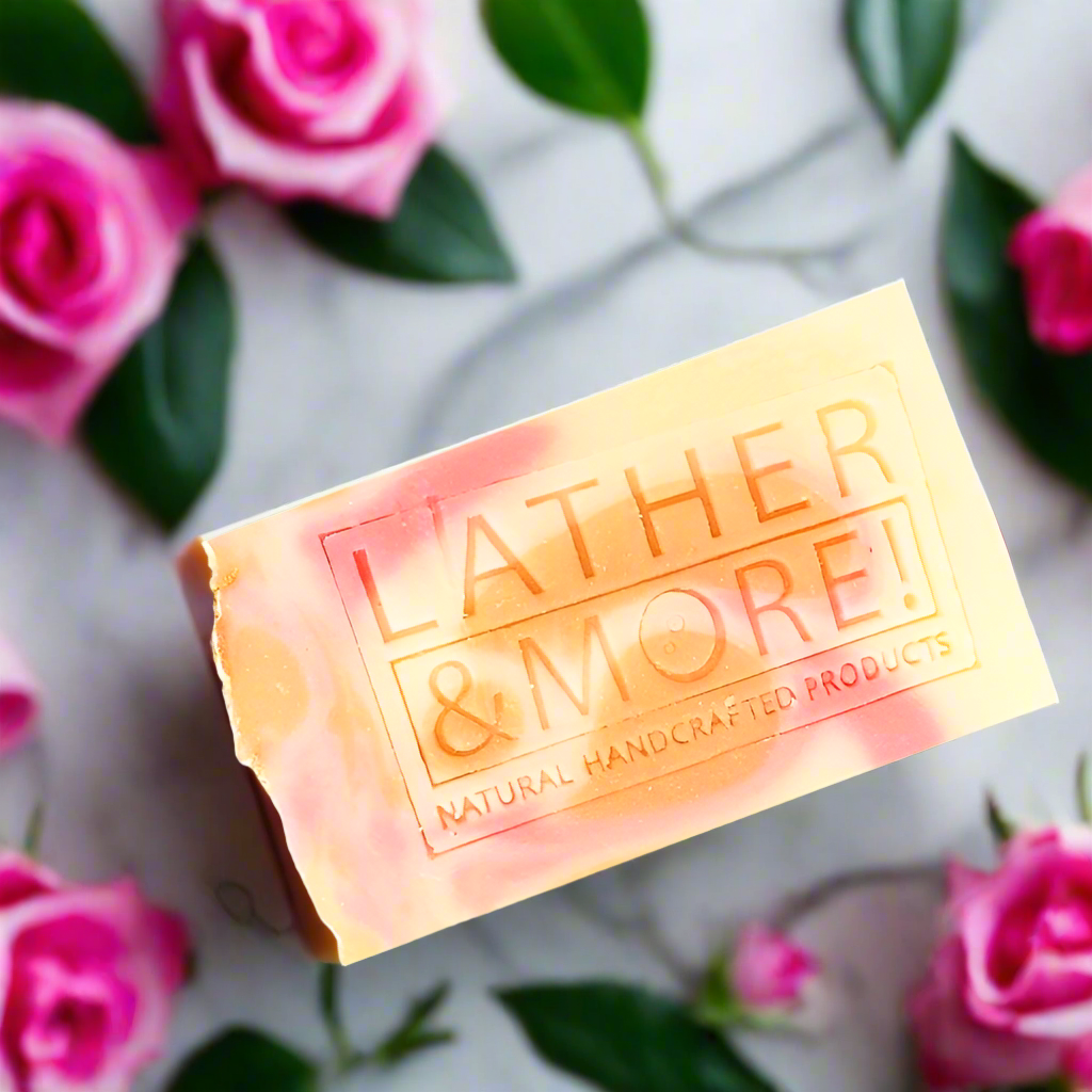 Love Tales soap bar surrounded by pink roses