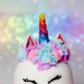 Lather and More Unicorn Princess Bath Bomb close-up detail of rainbow horn and colorful flower crown